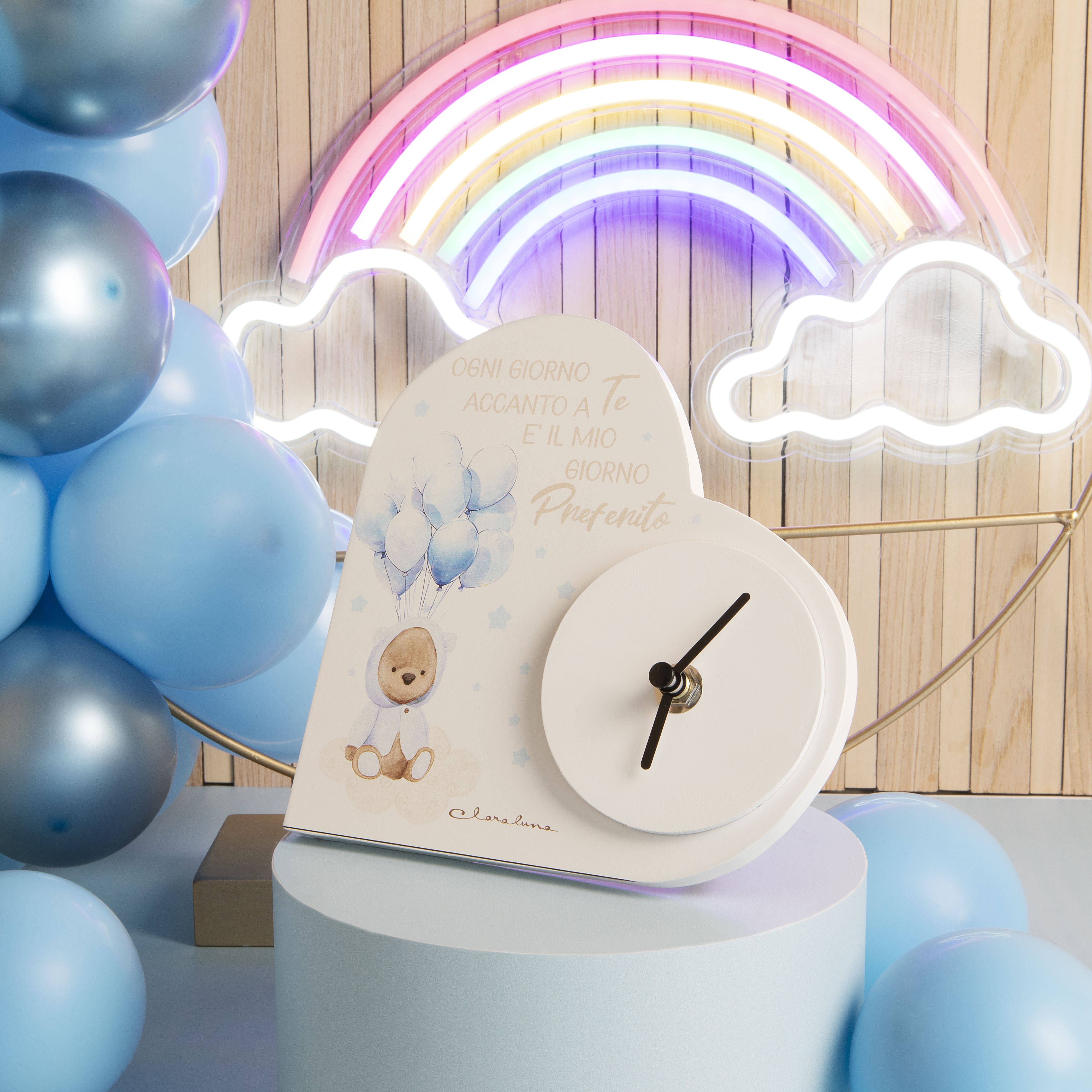 Bomboniera Claraluna Orologio Cuore con orsetto con cappottino azzurro e palloncini. 24934
