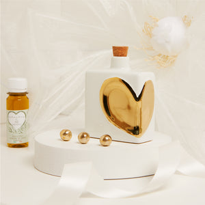 Bomboniera Claraluna Oliera in porcellana Bianca con Cuore in rilievo Gold con Olio 60ML 25076/O