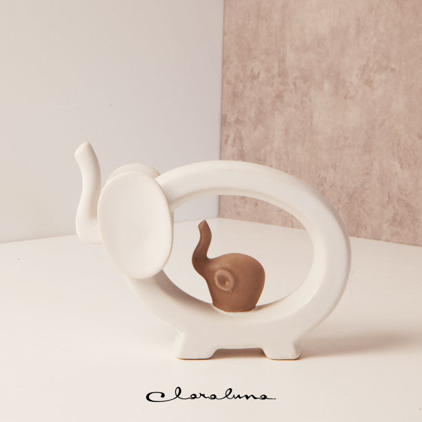 Bomboniera Claraluna Coppia Elefanti piccoli bianco e tortora in porcellana 23164